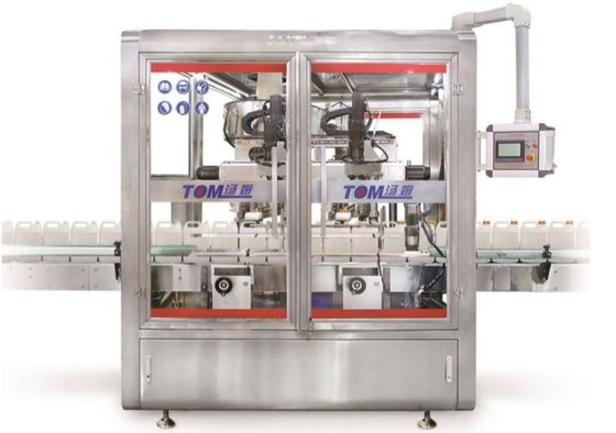 トラッキングタイプ 自動充填・蓋付機 2000BPH